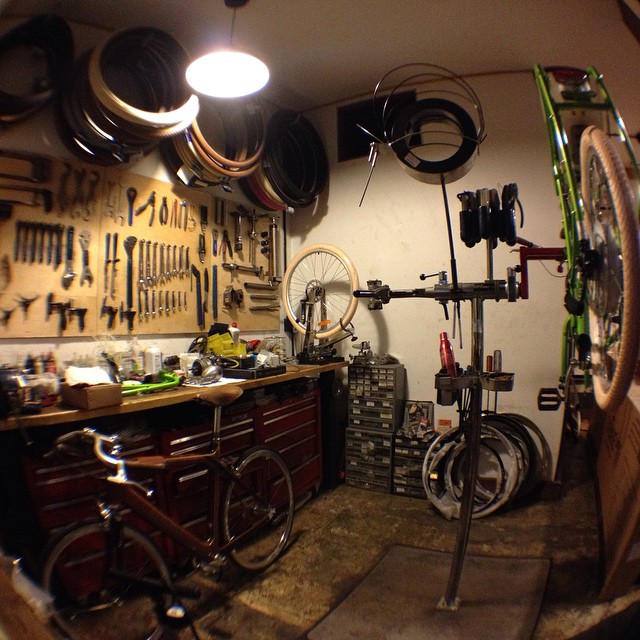 view into garage, featuring a bicycle and several tools