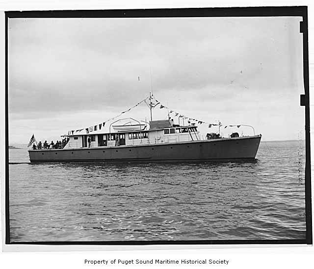 an old po of a large boat traveling in the ocean