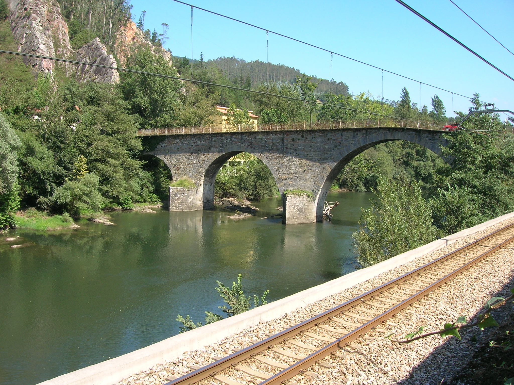 this is a view of a bridge over water