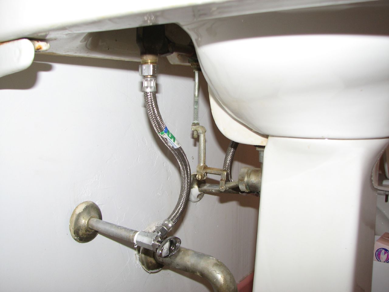 a closeup po of an odd looking metal sink