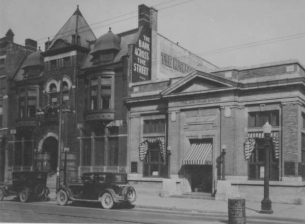 an old picture of an old commercial building