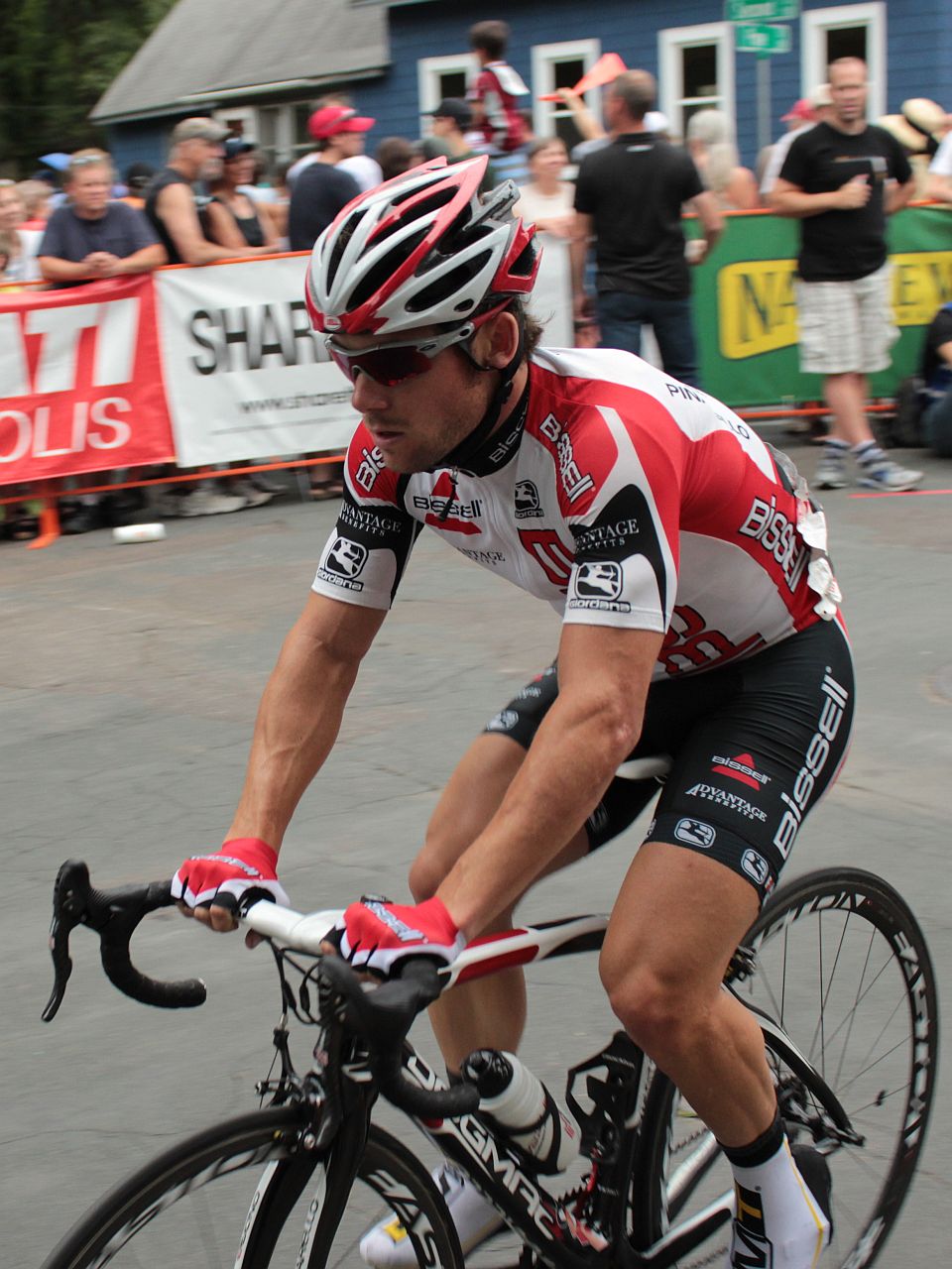 a bicyclist is taking off from the starting line