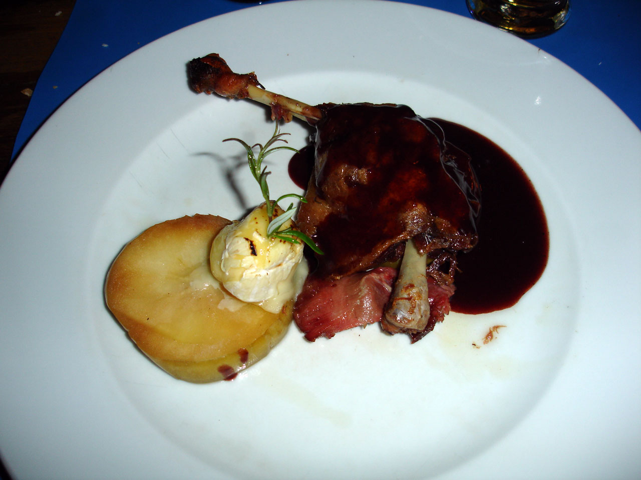 a plate of steak on a dinner table