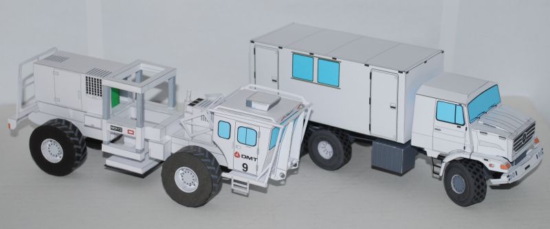 two model trucks with their containers stacked next to each other