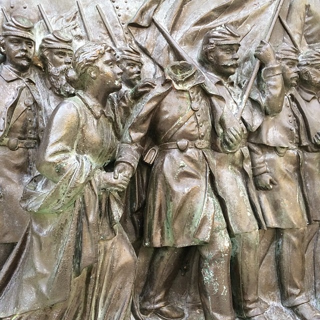 a statue of the soldiers and their name is on display