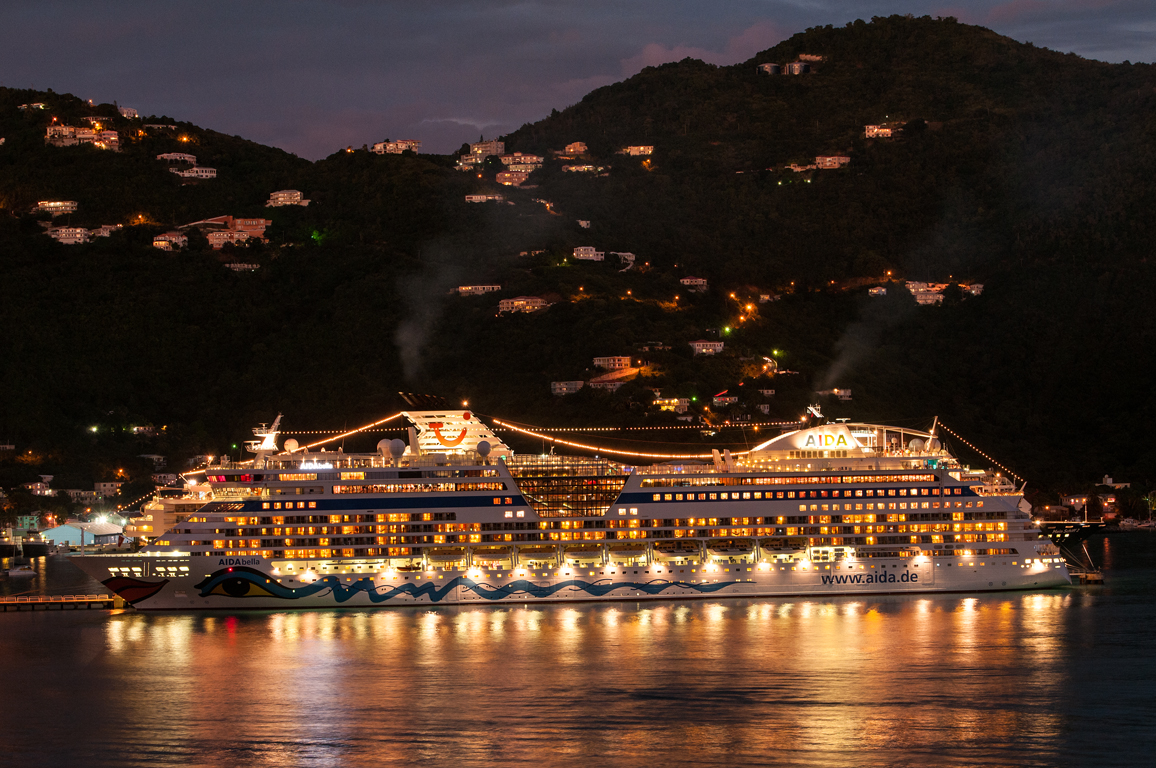 a cruise ship floating on top of a body of water