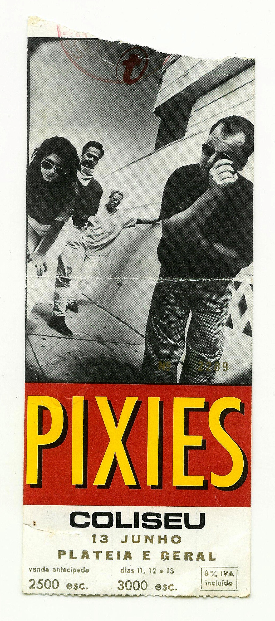 a poster for pixies coliseu in front of a wall