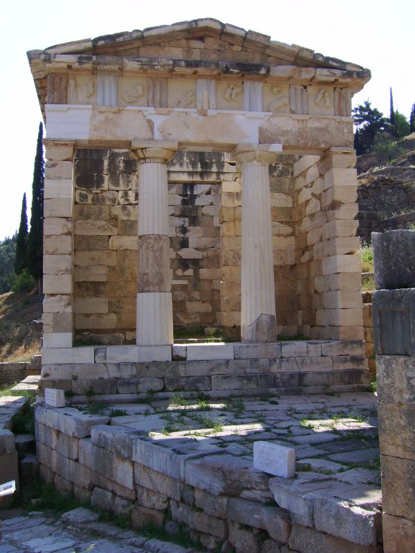 two greek ruins with large pillars on the top