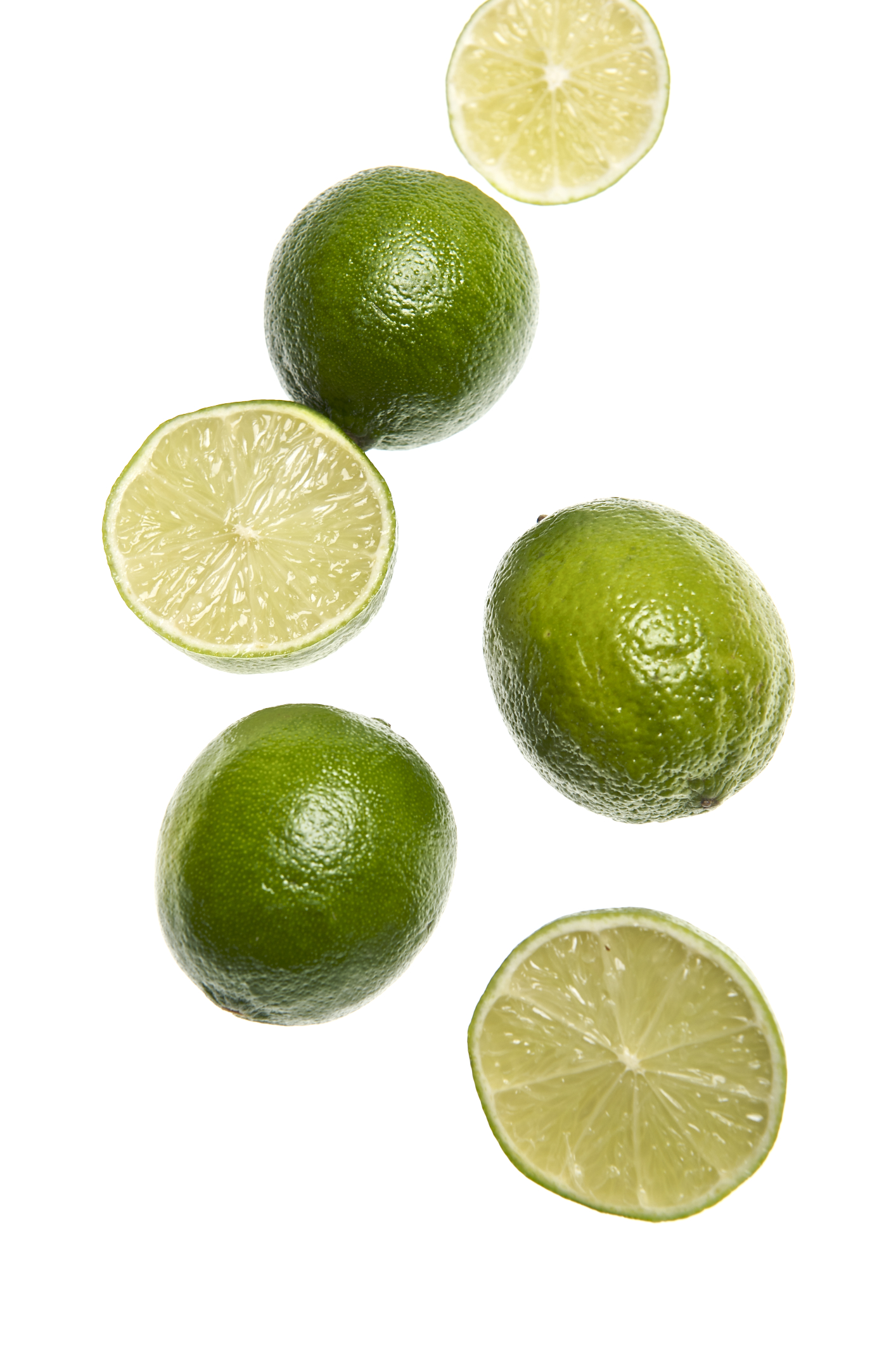 limes and half of the lime cut in half with one lemon on the side