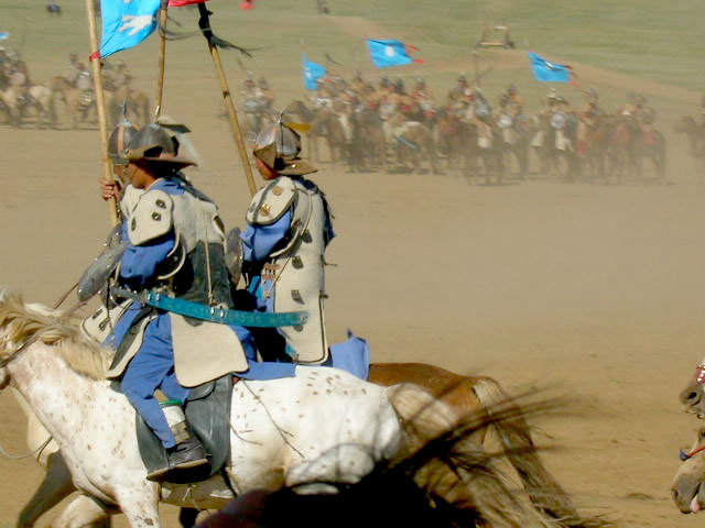 the two knights are riding on horses during a battle