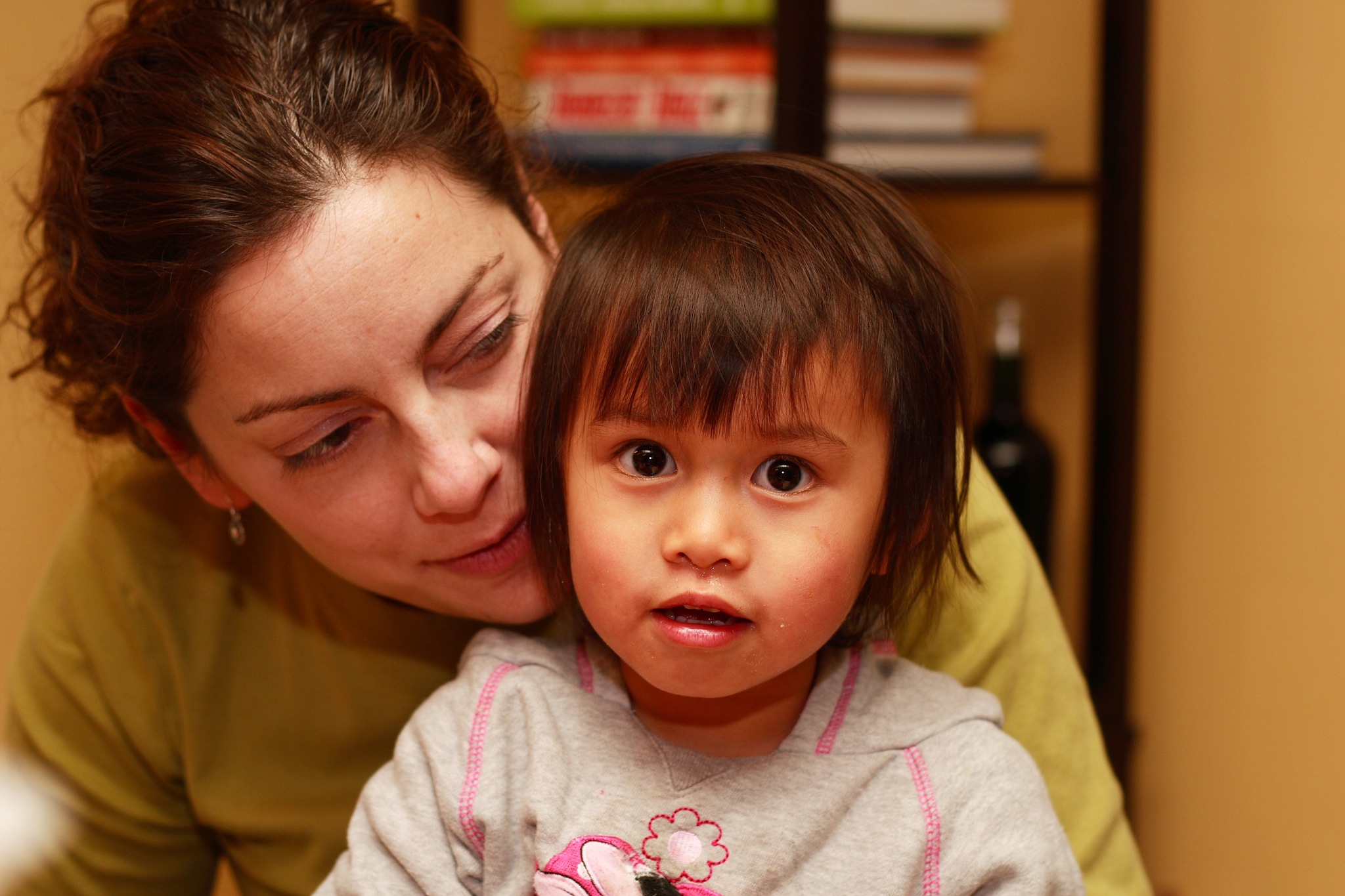 a woman and a young child sitting together