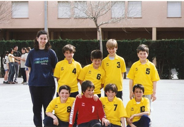 a soccer team posing together for a picture