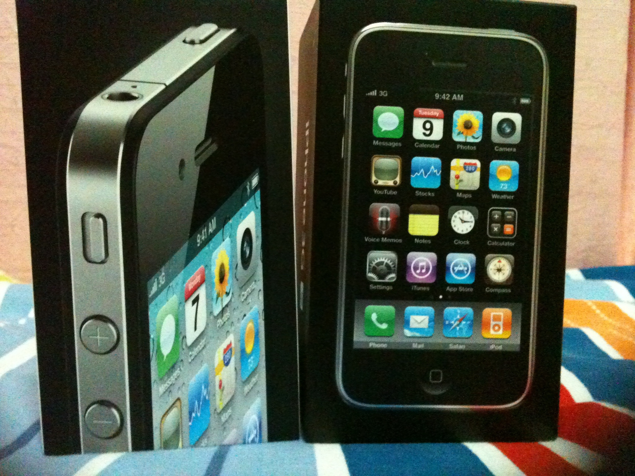 an iphone is in its case next to a box