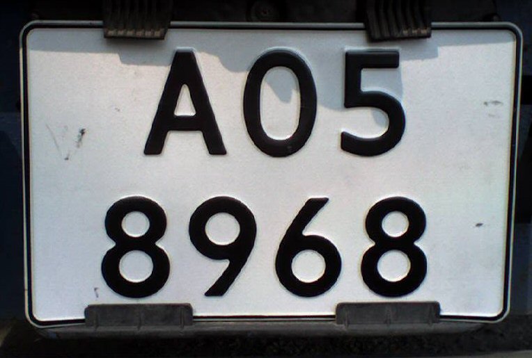 a close up of the letters on the license plate