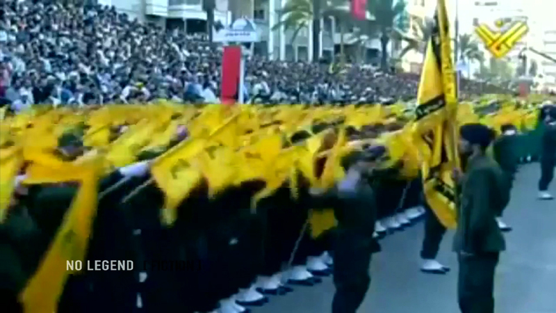 large group of uniformed people marching in a parade