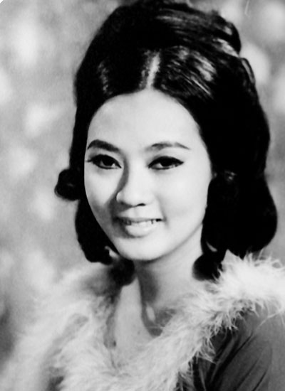 a black and white po of an asian woman