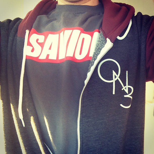 a man that has a shirt that says sayo