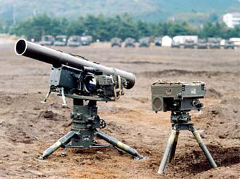a large camera and a larger camera set on stands