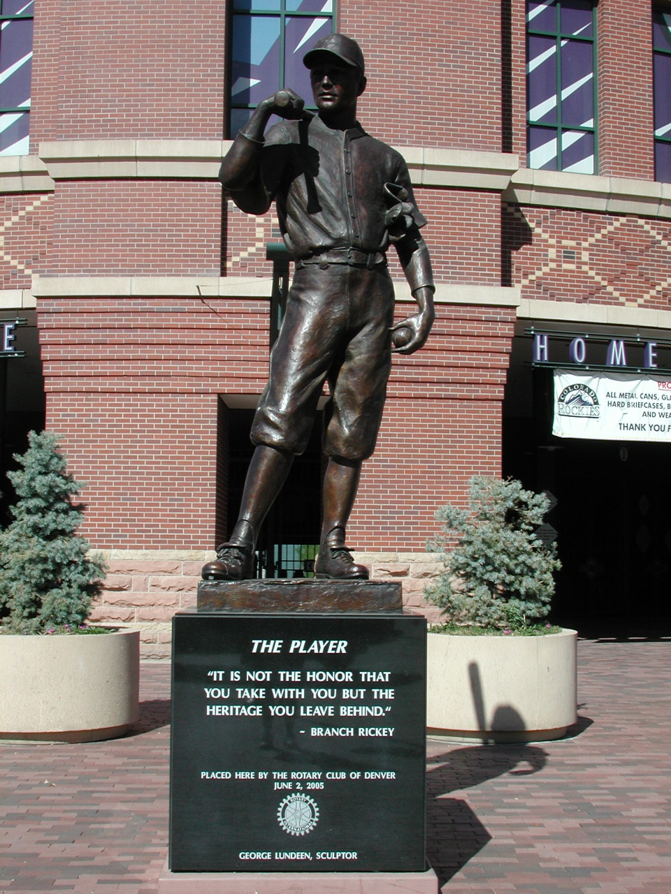 statue on base at the foot of the player