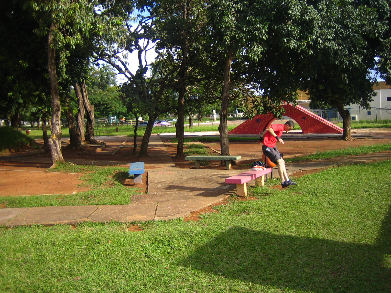 the woman is practicing stretching on a bench