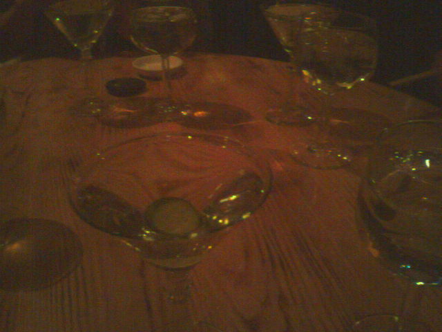 there are several glasses on the table top