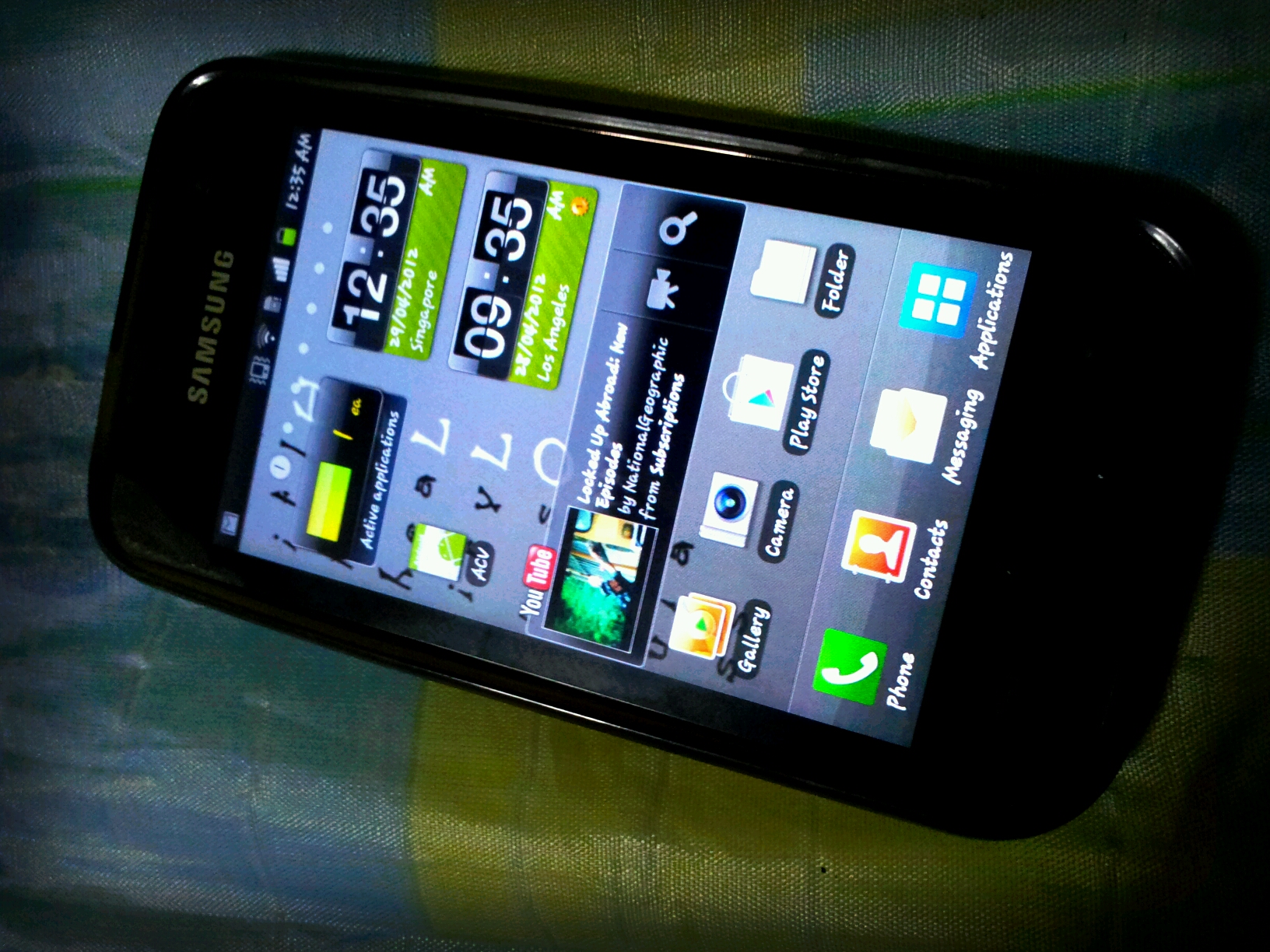 a cell phone displaying several important times displayed on display