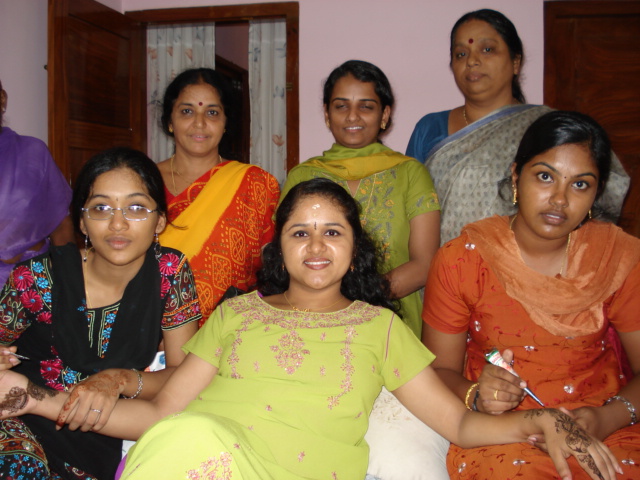 a group of women posing for the camera