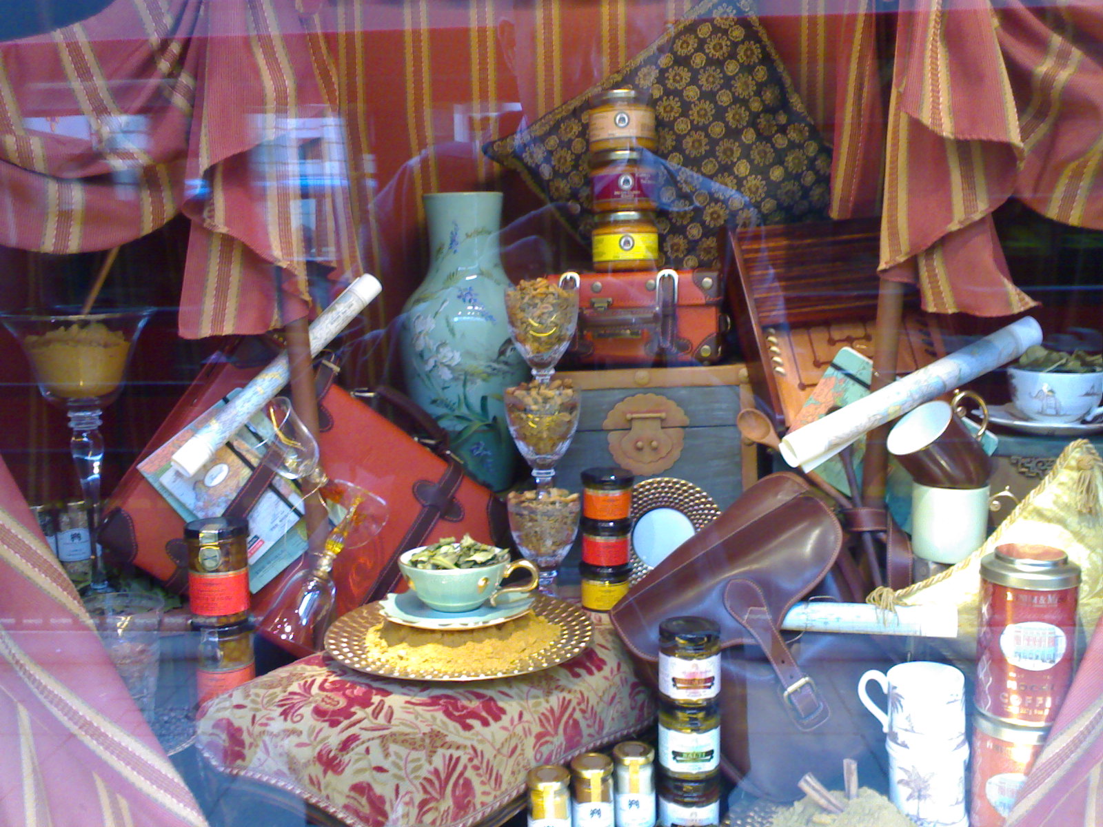 a close up of various types of pottery in a store display