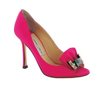 pink high heel shoes with an attached bow