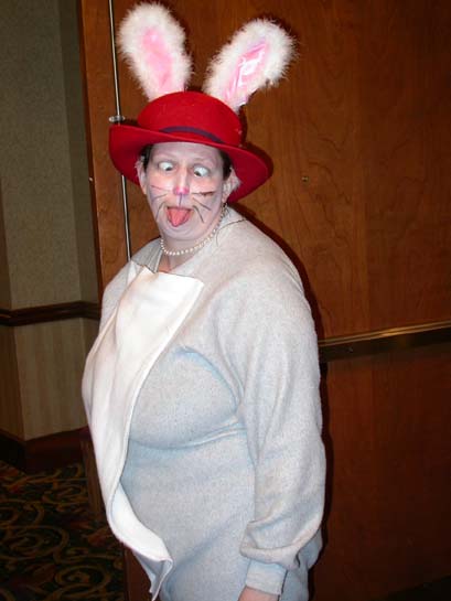 woman in a rabbit outfit with fake teeth on