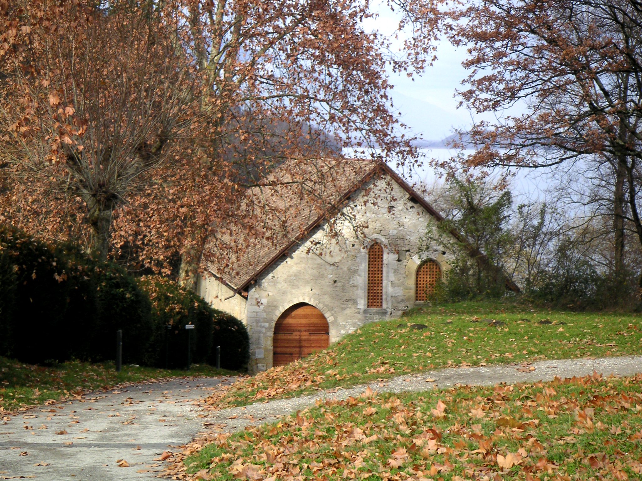 the stone house is beside of a path