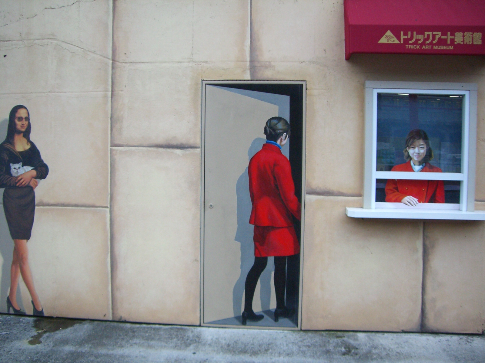 a mural depicting people wearing red and black clothing