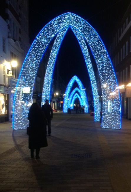 lighted arches and arches with lights in the middle of the streets