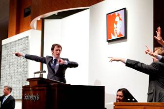 a man in suit raising his hands out to someone in a courtroom