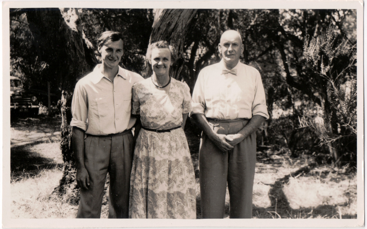 an old black and white po shows four people