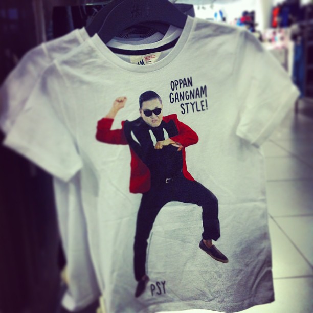 a t - shirt with a picture of a man dancing