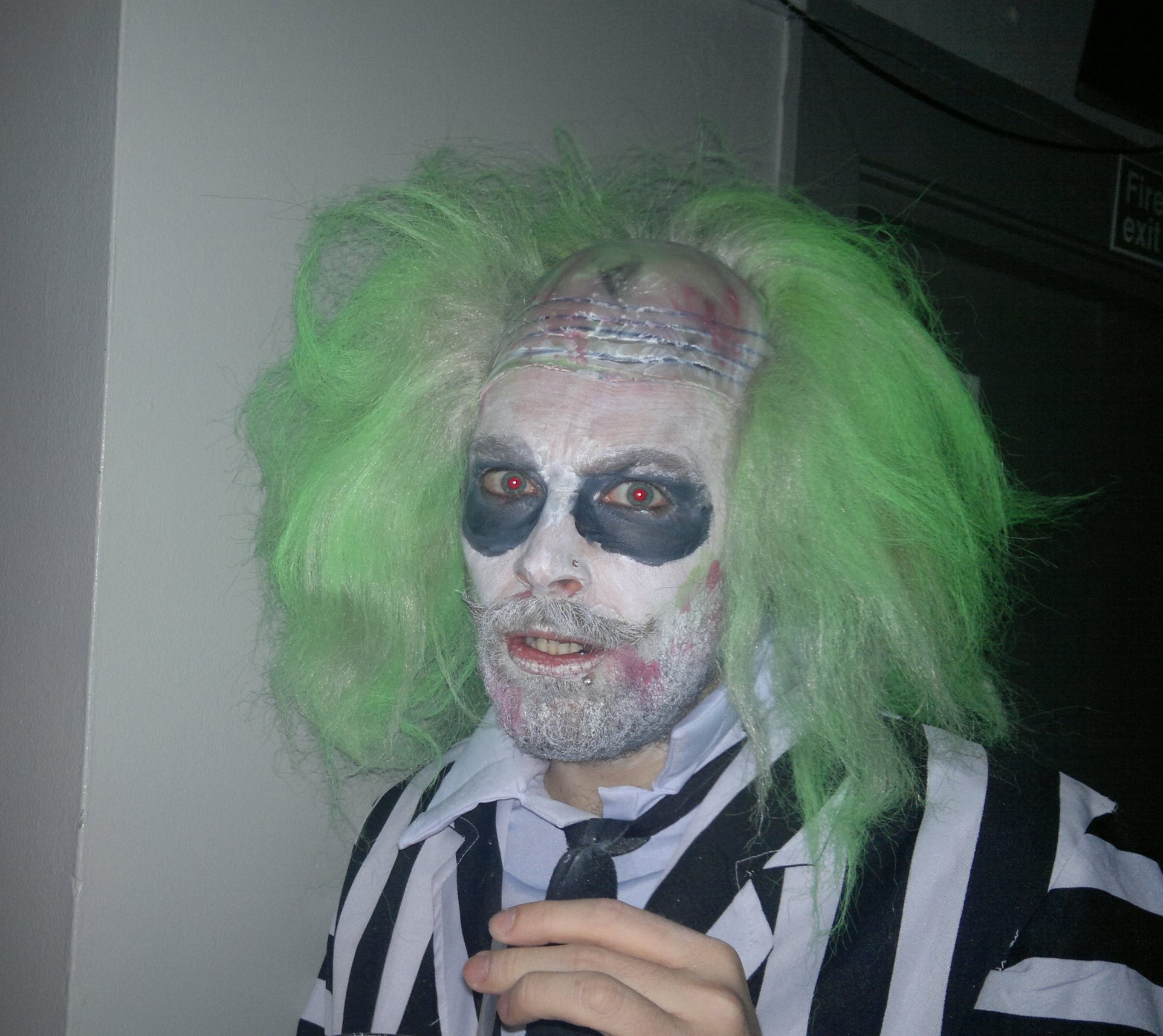 a person dressed up in a  cell costume