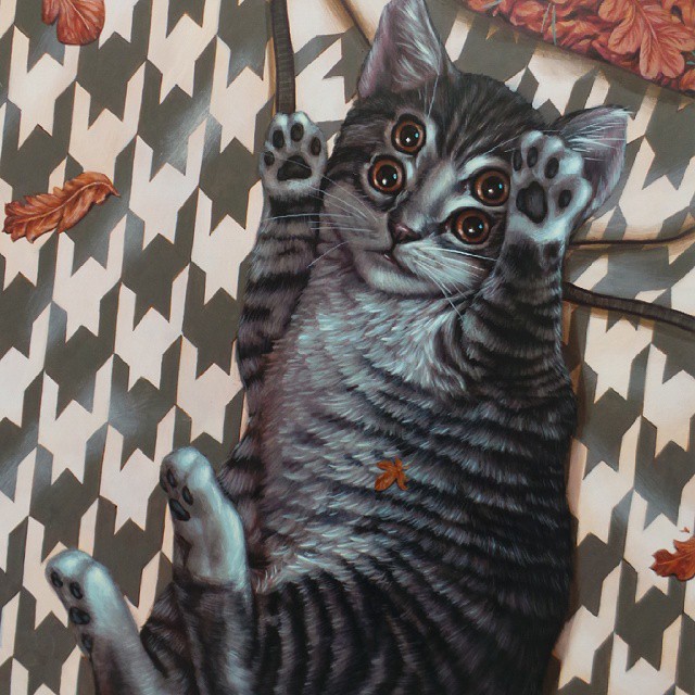 a drawing of a cat on a checkered background