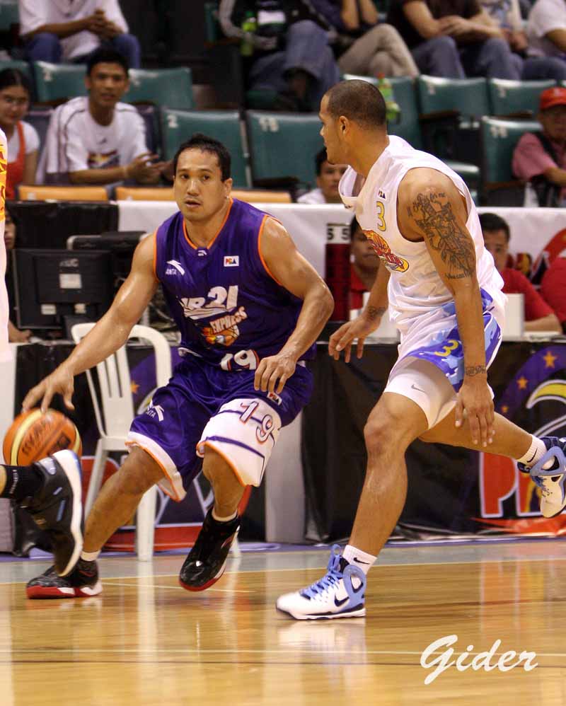 basketball players in the midst of a game