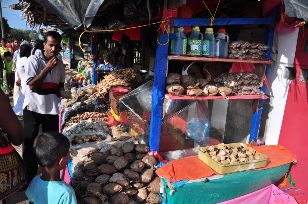 an image of an outdoor market scene with food