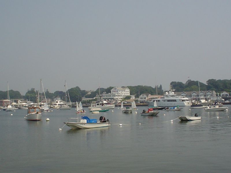 a number of small boats on a body of water