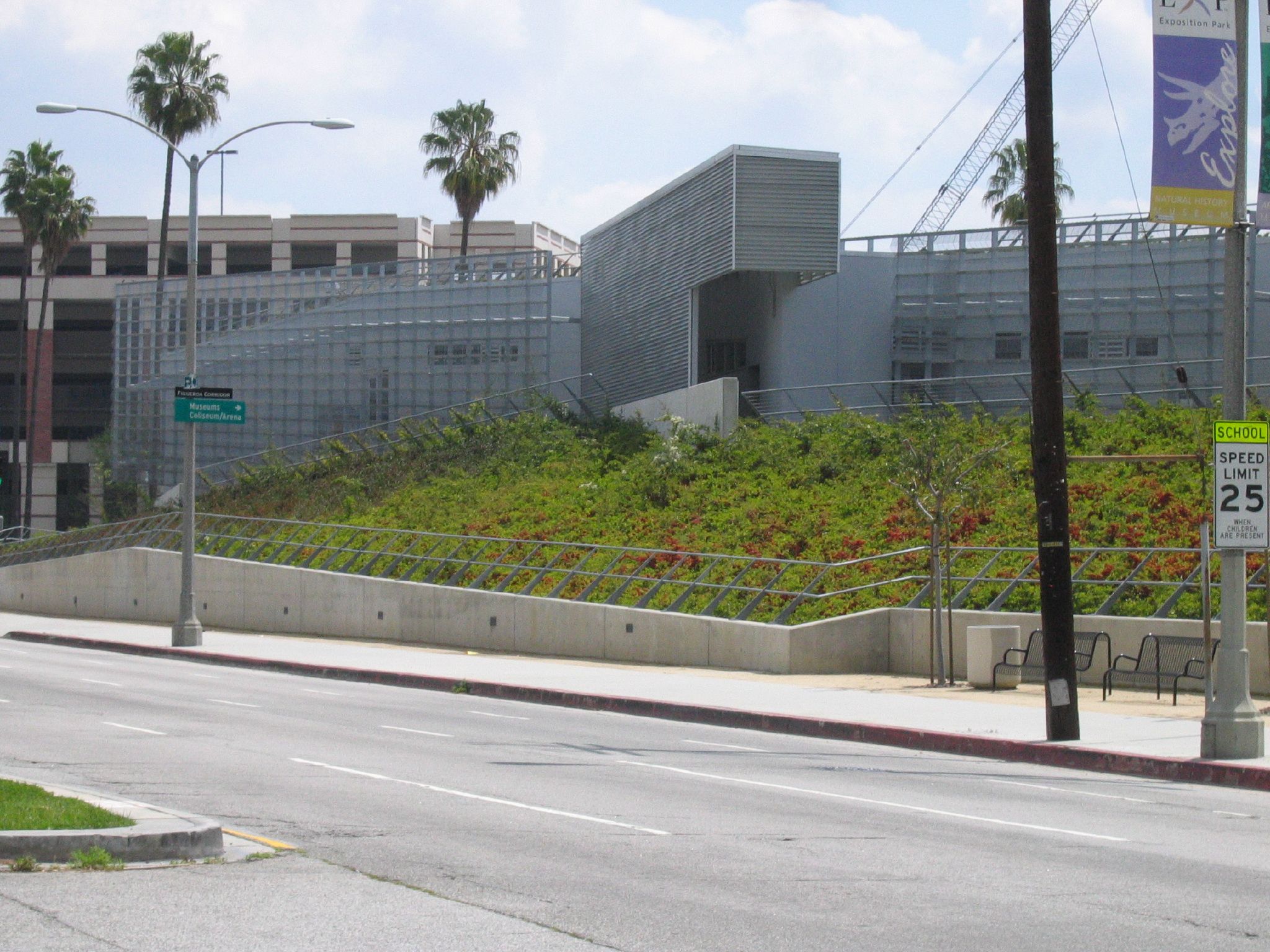 an empty street with the road fence in front