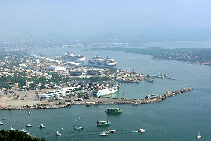 a harbor is surrounded by many large ships