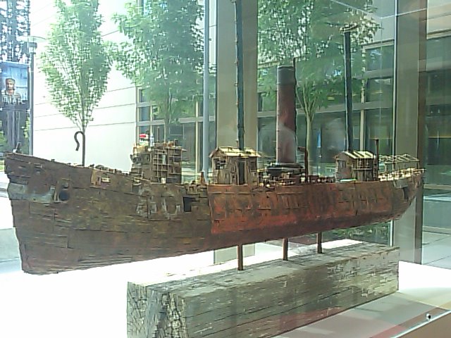 a model of an old ship in a display case