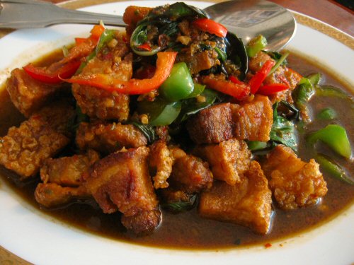 an asian dish with stew and vegetables