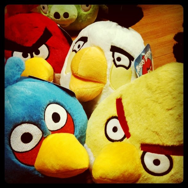 several angry birds and other stuffed animals