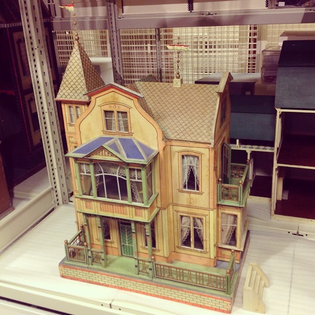 a model house on display in a store window