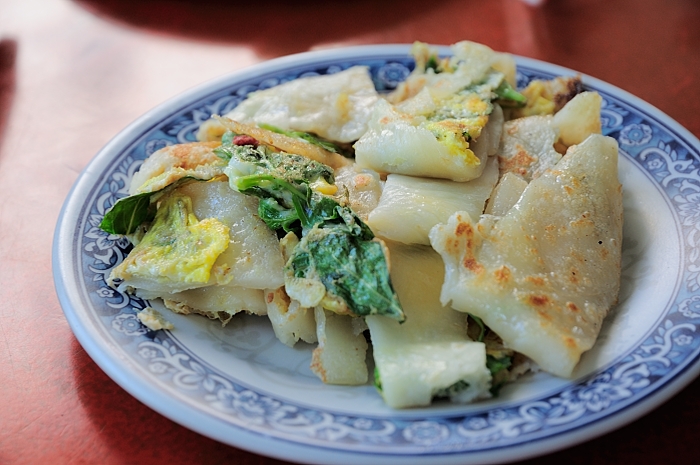 a blue and white plate that is on the table