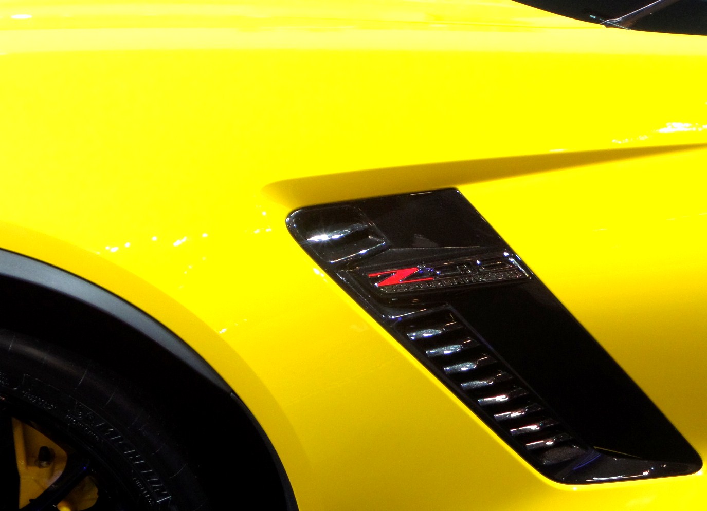 the front bumper of a large sports car