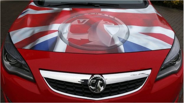 the front grille on a red car with an american flag design